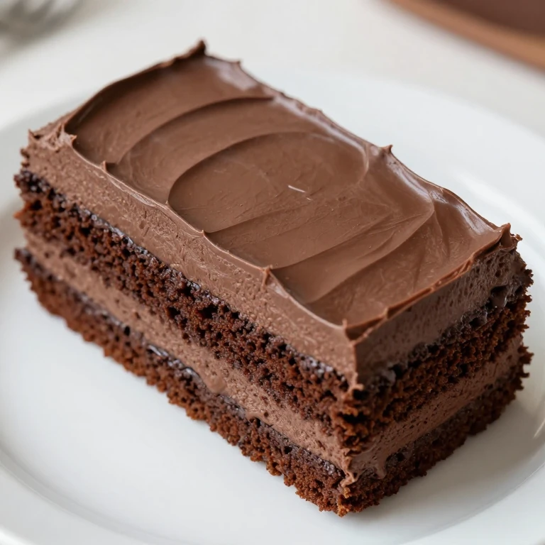 Dark chocolate sour cream sheet cake with frosting