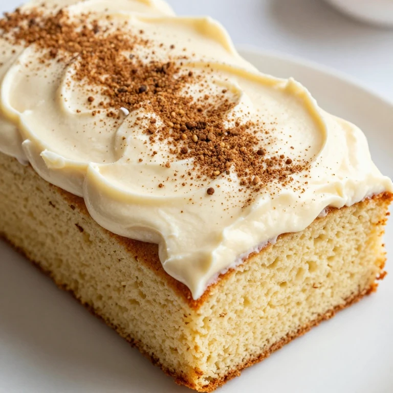 Eggnog rum sheet cake with eggnog rum buttercream and nutmeg dust