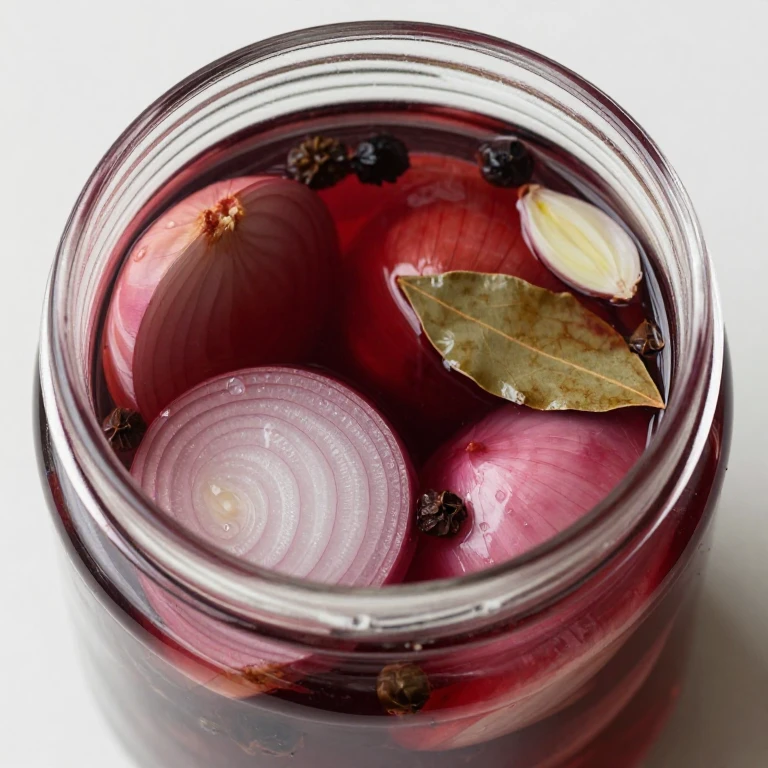 pickled shallot halves in burgundy brine with juniper berries