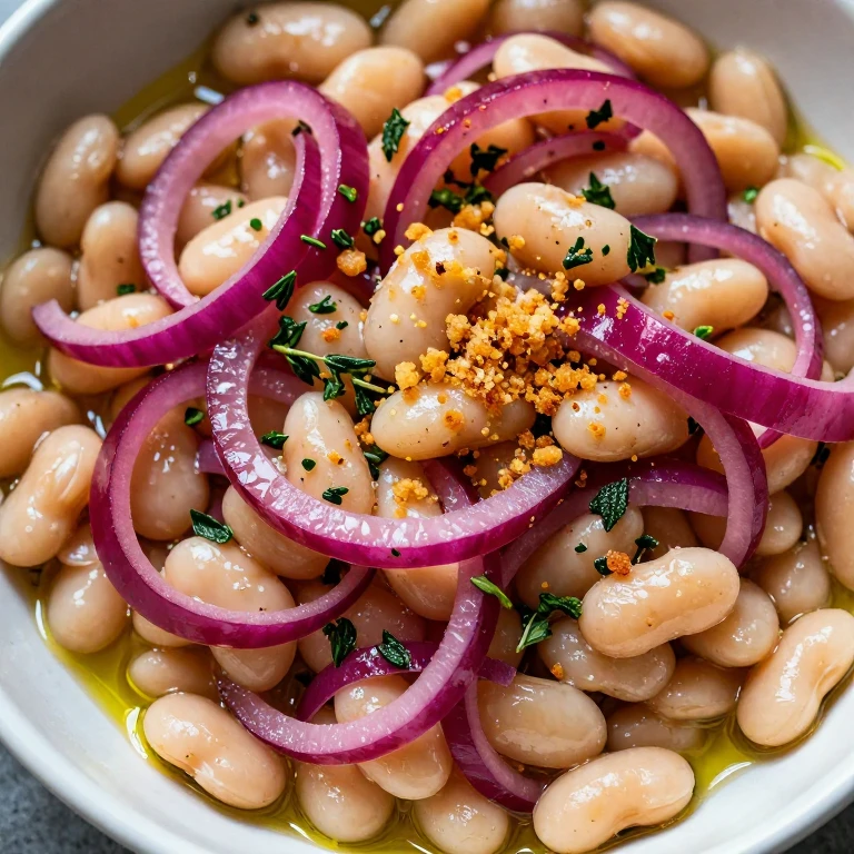 white bean salad with pickled onions and crispy breadcrumbs