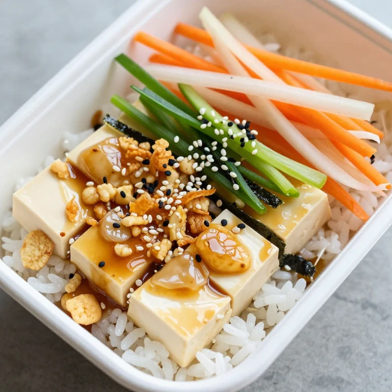 Ginger-soy tofu with pickled vegetables and crispy rice topping