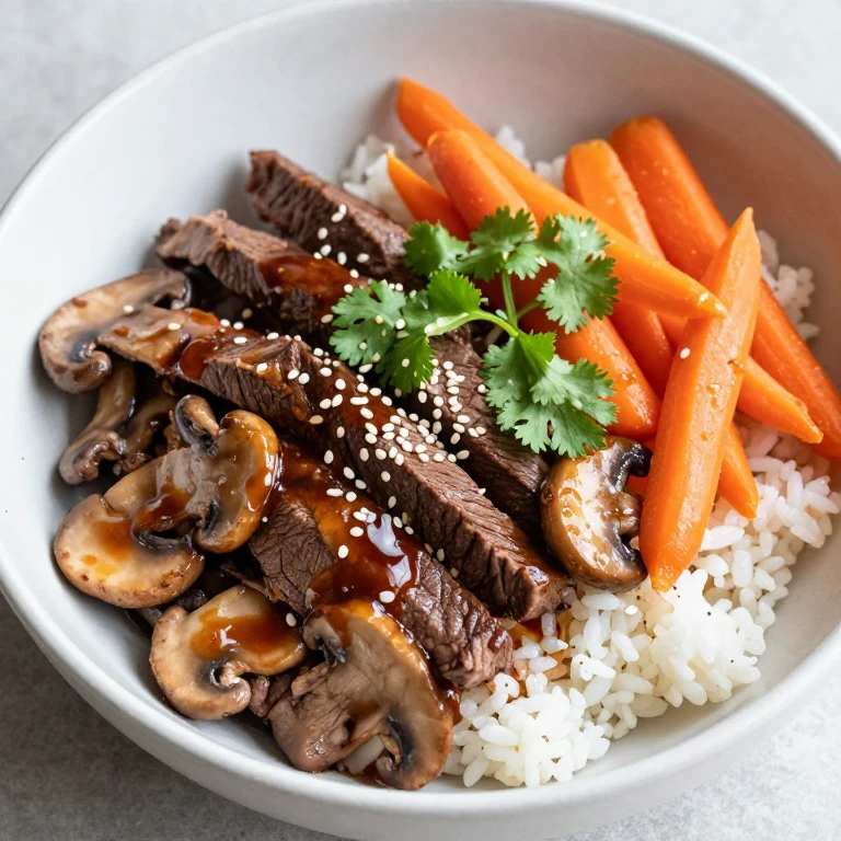 Mushroom carrot beef teriyaki bowl with cilantro and sesame