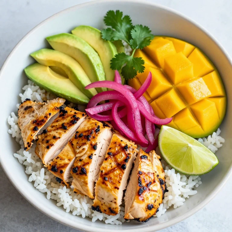 Grilled mango chicken with avocado, pickled onions, and cilantro